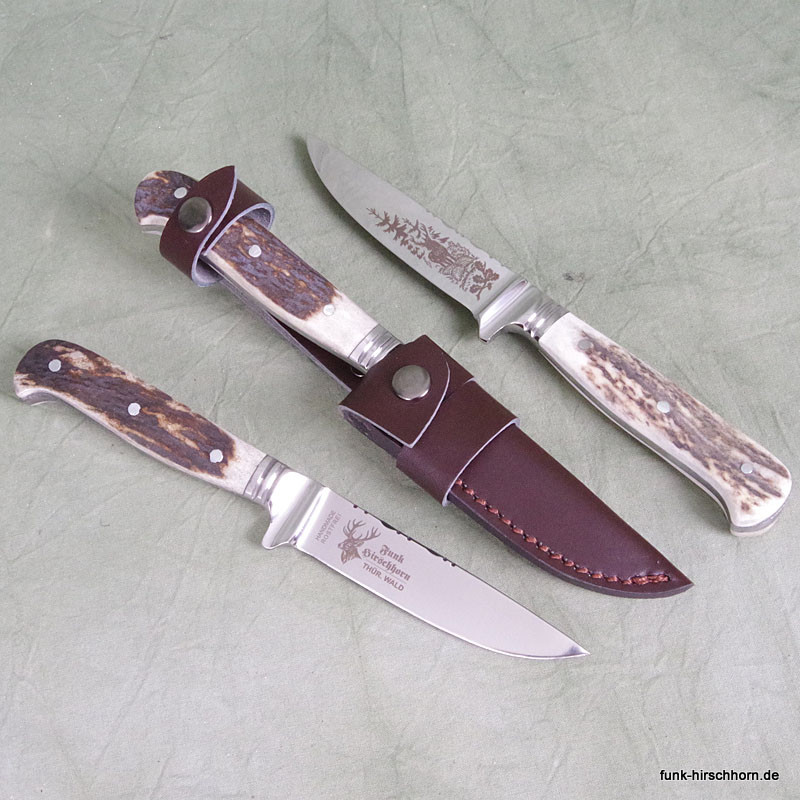 Jagdnicker mit Hirschhornschalen und Motivklinge